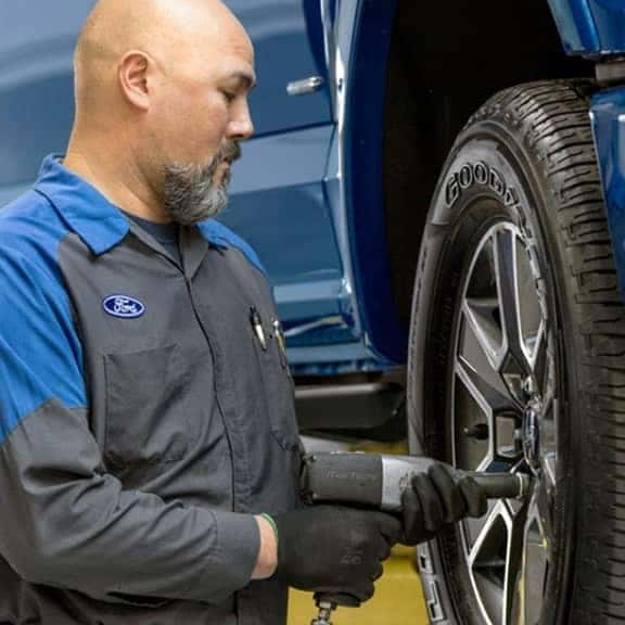 Mechanic changing tire