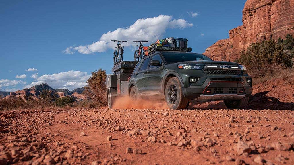 2022 Explorer Timberline driving through a dirt road.