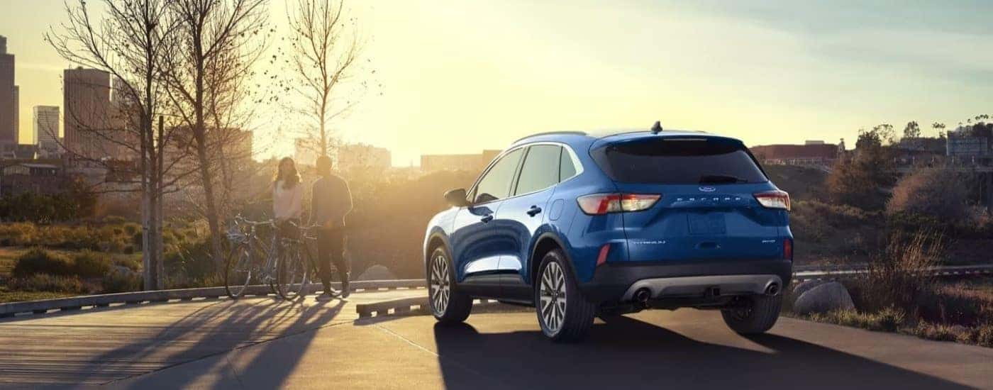 Blue 2022 Ford Escape Titanium parked at sunset