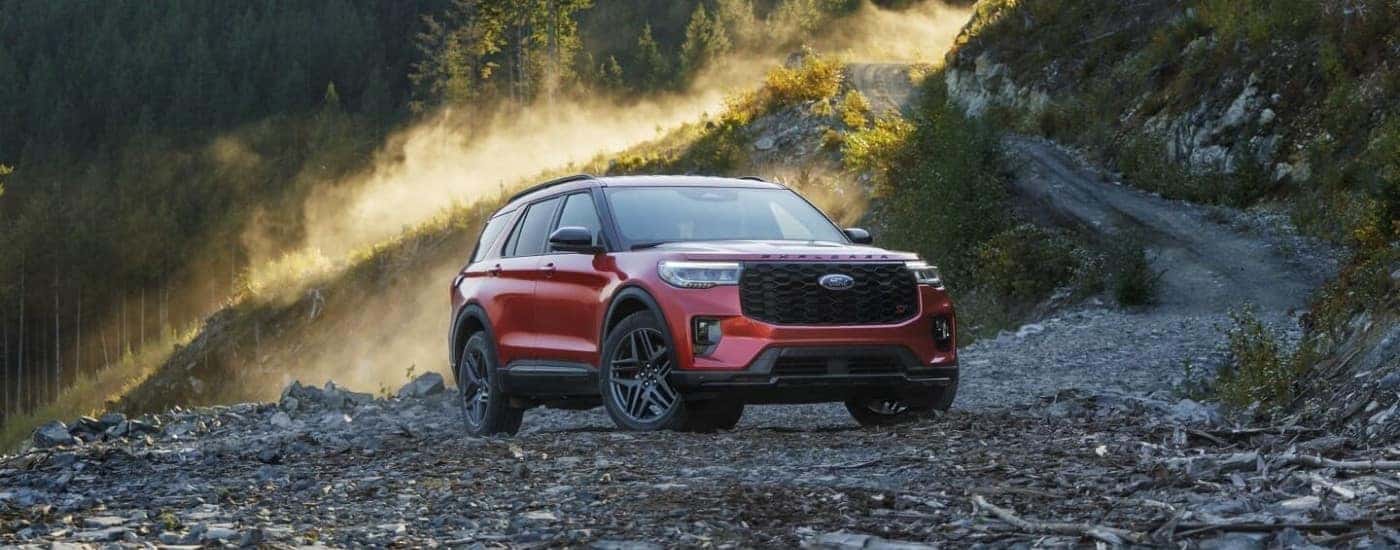 Red 2026 Ford Explorer ST parked on rocks