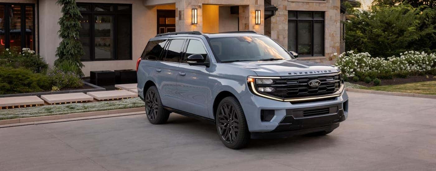 Grey 2026 Ford Expedition parked in front of a house
