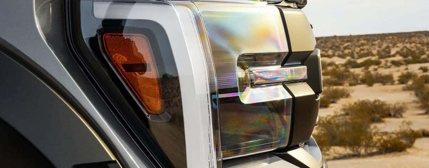 Close-up of a headlight on a 2026 Ford F-150.