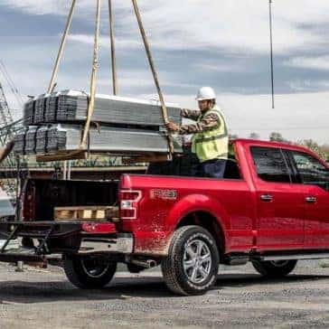 Machine-Loading-Heavy-Objects-in-Bed-of-2019-Ford-F-150
