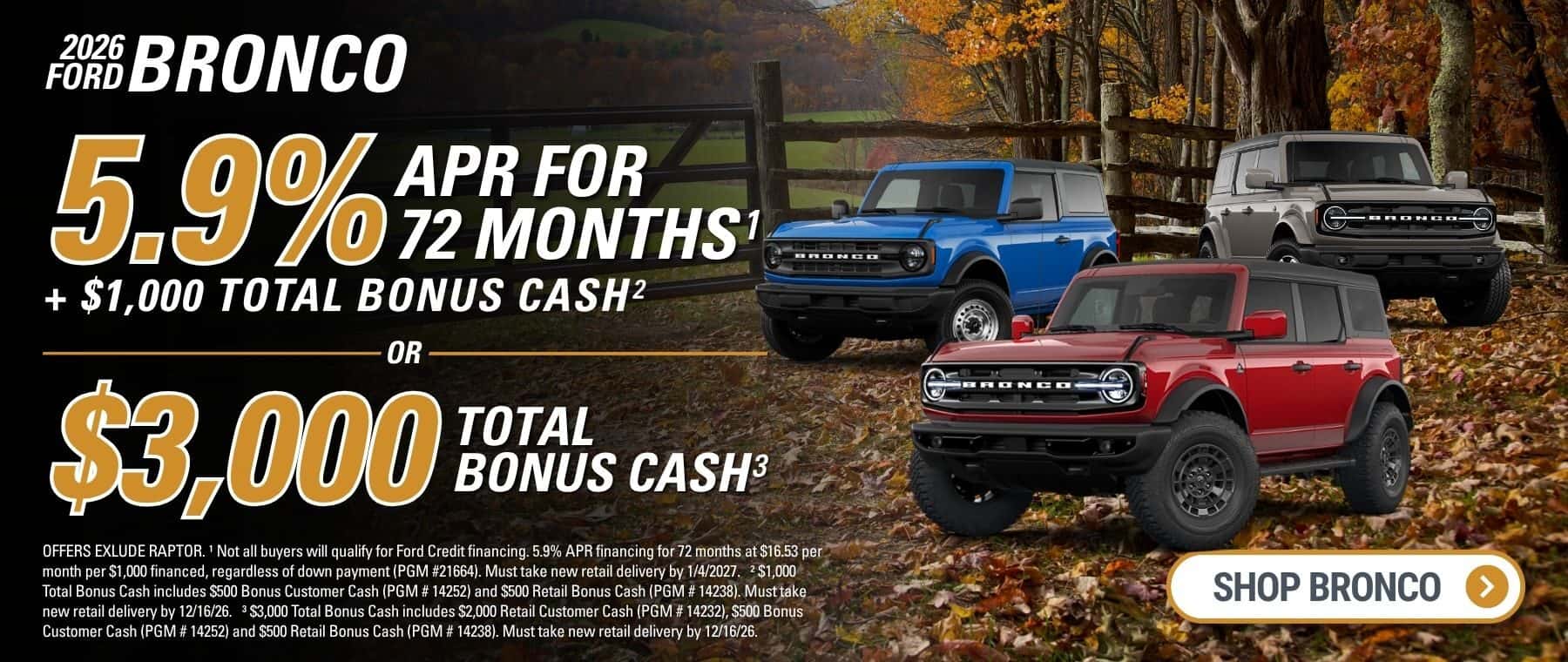 A banner with the text "2026 Ford Bronco", an offer of "5.9% APR for 72 Months + $1,000 Total Bonus Cash OR $5,000 Total Bonus Cash”. There is a white "Shop Bronco" button in the bottom right corner. The right side depicts one blue, one red, and one brown Bronco. The background depicts a serene fall landscape with colorful leaves, an old wooden fence, and a field surrounded by trees.