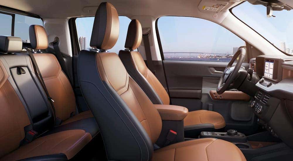 Interior view of the 2022 Ford Maverick with spacious grey and brown leather seats