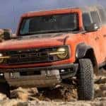 An orange 2022 Ford Bronco Raptor is shown