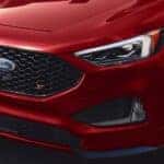 A close up of the front of a red 2022 Ford Edge ST for sale is shown.