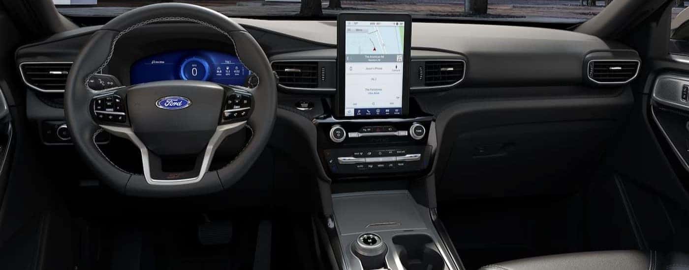 The black interior and dash in a 2024 Ford Explorer is shown.