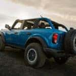 A blue 2025 Ford Bronco from the rear.