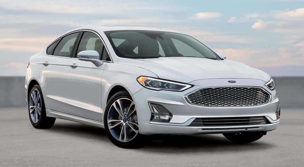 A white 2020 Ford Fusion parked after viewing used cars for sale near Pueblo West.