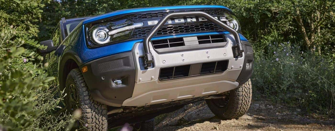A blue 2025 Ford Bronco Sport off-roading.