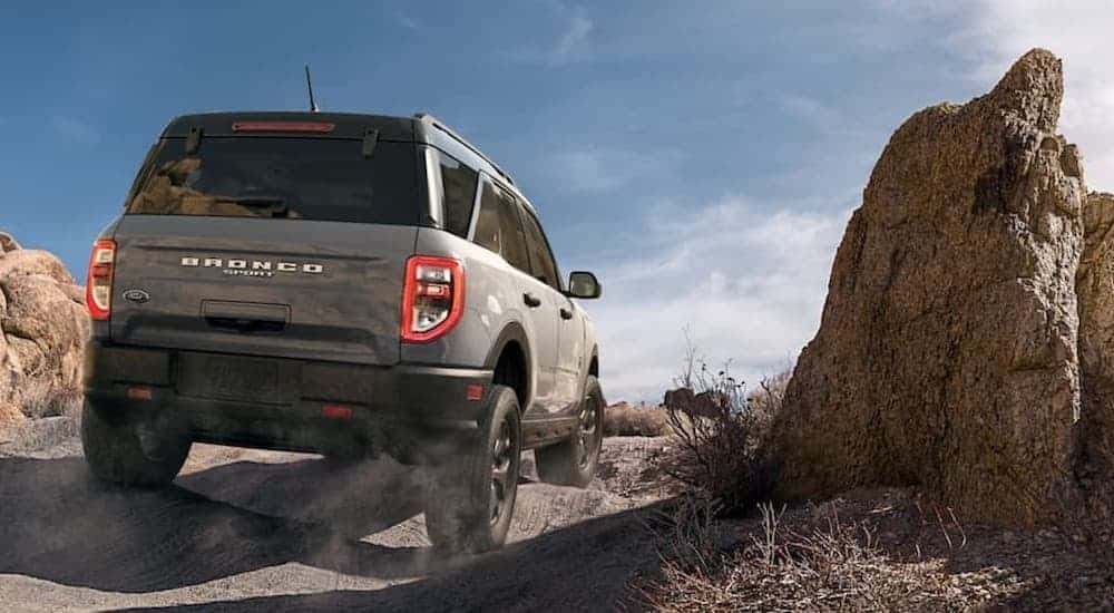 A gray 2021 Ford Bronco Sport driving off-road.