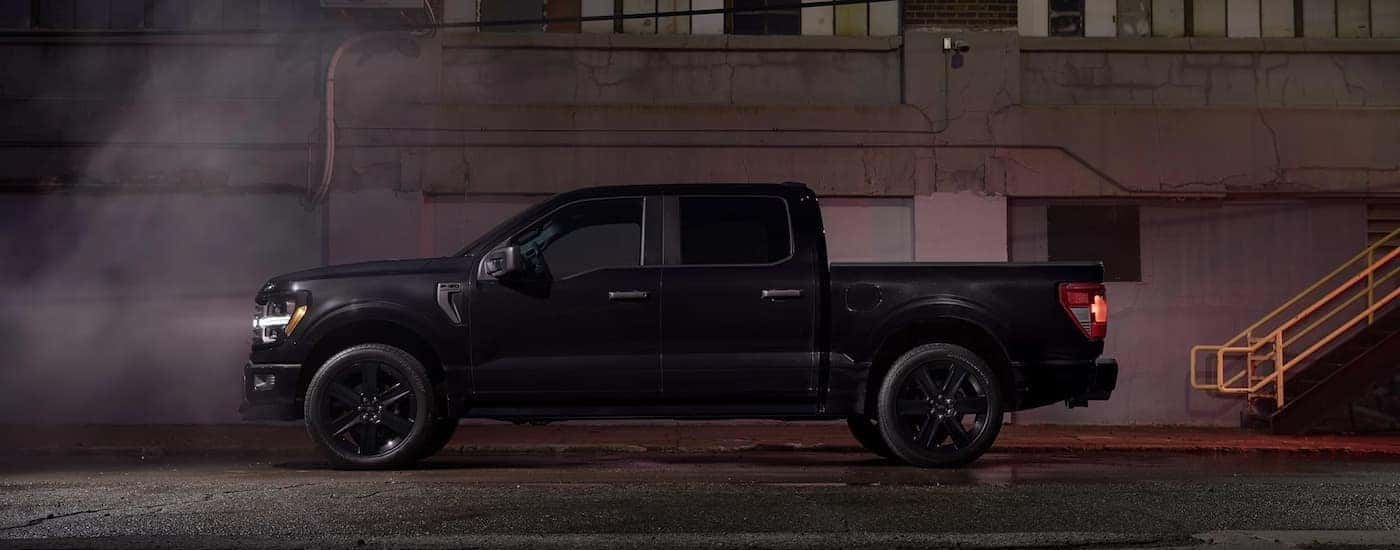 A black 2025 Ford F-150 LOBO parked in a tunnel.