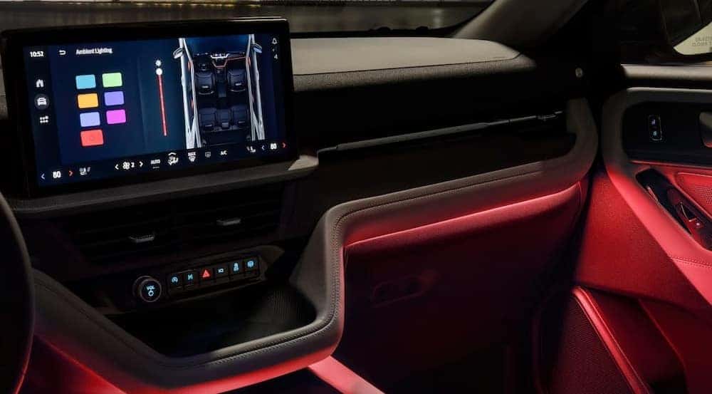 Black and red interior and dash in a 2025 Ford Explorer for sale near Carmel.