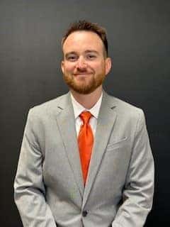 Purchasing agent Jason Pavia is shown.