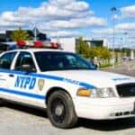 Motor car Ford Crown Victoria Police Interceptor of the NYPD in the city street.