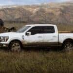 2026 Ford F-150 driving through muddy terrain