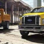 Ford service trucks parked under bridge after fall maintenance near Muncie Indiana