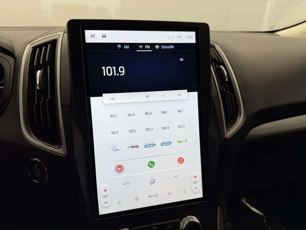 Interior of a 2023 Ford Edge featuring SYNC 4A touchscreen and digital controls