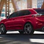 2024 Ford Edge ST driving through downtown