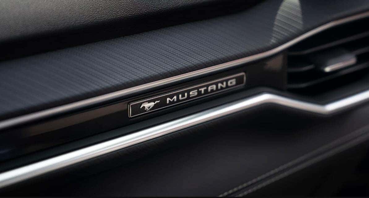 Close up of 2026 Ford Mustang interior badge and dashboard trim