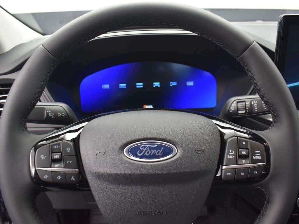 Interior of 2024 Ford Escape showing SYNC 4 touchscreen and dashboard