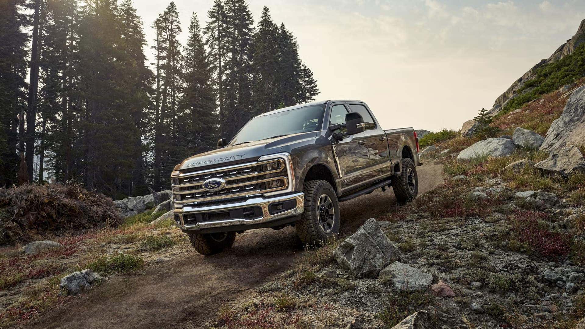 A ford f-350 driving off-road.