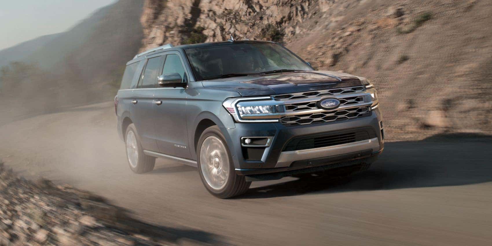Ford Expedition driving on road