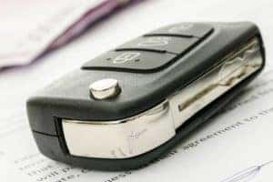 Car keys on top of finance application