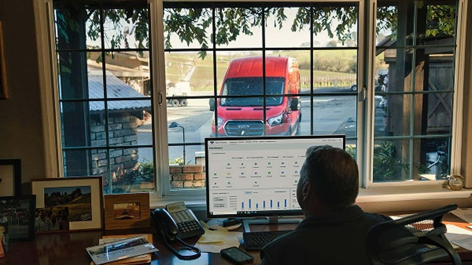 man looking at computer