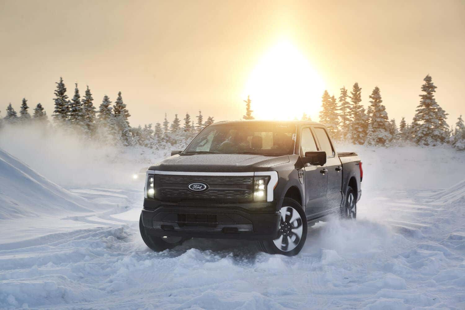 Black Ford F150 Lightning Electric Pickup Snow