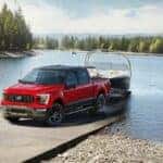 Red Ford Pickup Boat Water