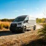 White Ford Transit Trail Van Green Grass