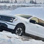 Black and White Ford F-150 Lightning Truck Snow