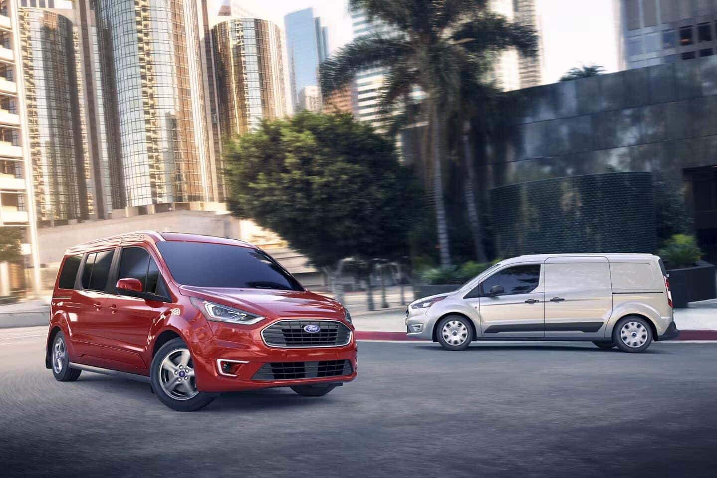 Red and Gray Ford Transit Connect Vans Buildings