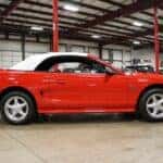 Red Ford Mustang Sports Car Garage