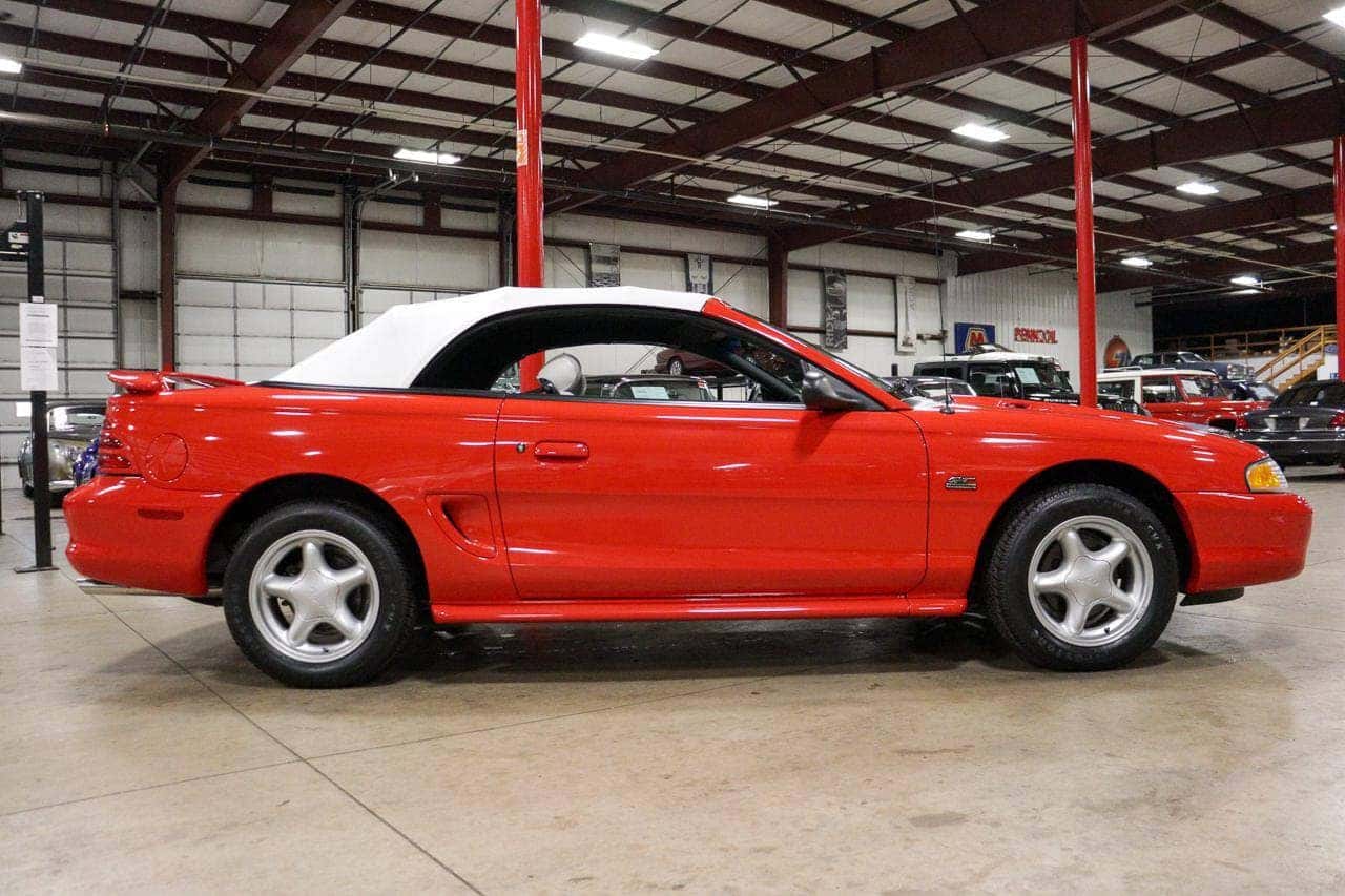 Red Ford Mustang Sports Car Garage