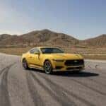 Yellow Ford Mustang Sports Car Mountains
