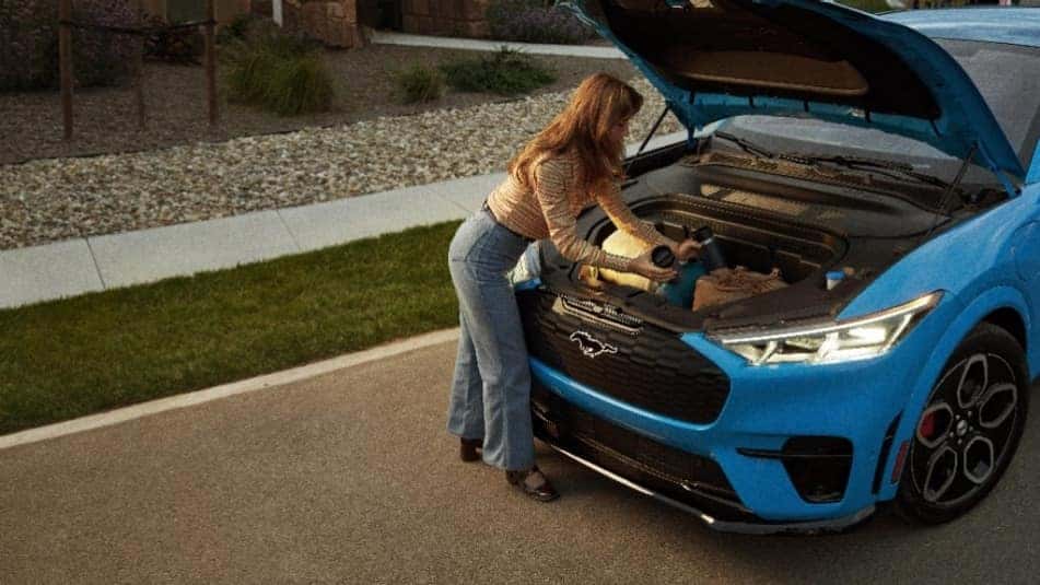Blue Ford Mustang Mach-E SUV Woman