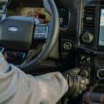 Ford F-150 Interior Infotainment System Buttons Black Gloves