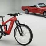 Red Ford Mustang and EBike