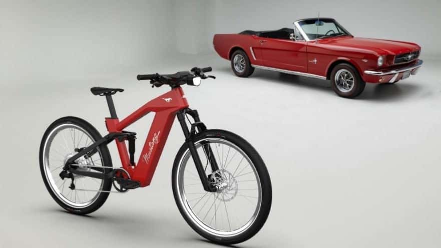 Red Ford Mustang and EBike