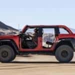 Red Ford Bronco SUV Woman Outside Dirt