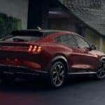 Red Ford Mustang MAch-E SUV Lights People Outside