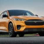 Yellow Ford Mustang Mach-E SUV Racetrack