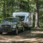 Black Ford F-150 Pickup Trailer Trees Lake