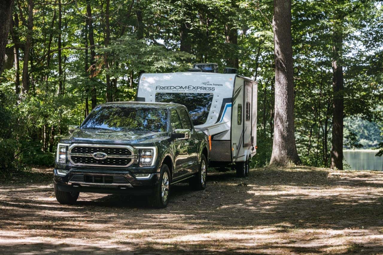 Black Ford F-150 Pickup Trailer Trees Lake