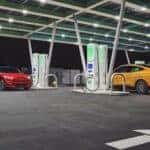 Red and Yellow Ford Mustang Mach-E EV SUV Electric Charging Station