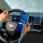 Ford Steering Wheel Black Cell Phone Person