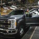 Gray Ford Super Duty Truck Man in Factory